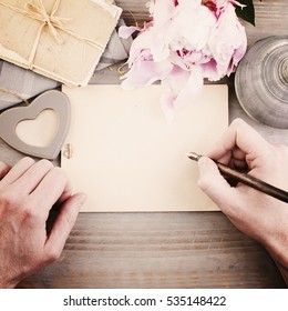 Vintage Background With Male Hands, Pen And Paper. Man Writing Love Letter