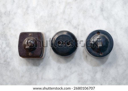 Vintage Bakelite wall switch and socket set — retro rotary light switches and outlet