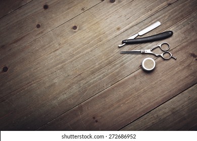 Vintage Barber Equipment On Wood Background