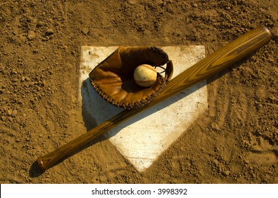 Vintage Baseball With Bat On Home Plate