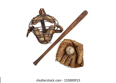 Vintage baseball glove, bat, ball and catchers mask isolated on a white background - Powered by Shutterstock