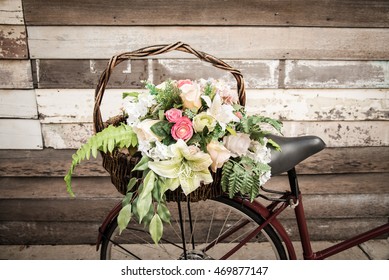 white bike basket with flowers