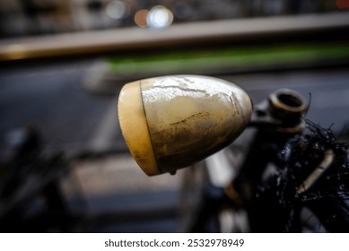 vintage bicycle headlight with chrome and rusty with cracks and yellow light photography in Milan Italy - Powered by Shutterstock