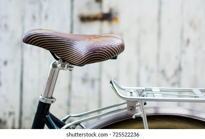 Vintage bicycle with leather seat close up