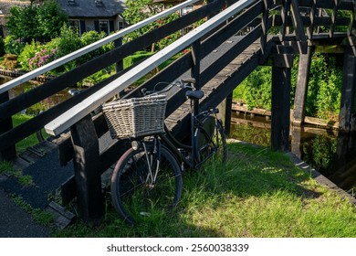 Vintage bicycle parked on the old street in Giethoorn village. - Powered by Shutterstock