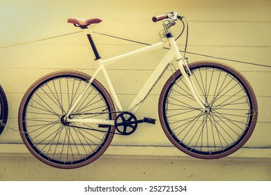 Vintage bicycle - selective focus , processing vintage effect and sunflare filter