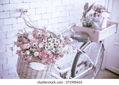 vintage bicycle with welcome sign on vintage white brick wall,warm and pastel,split toned. - Powered by Shutterstock