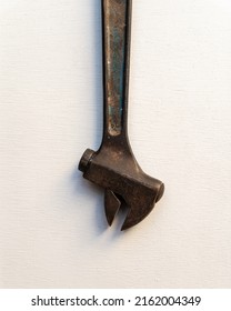 Vintage Big Wrench On White Background.