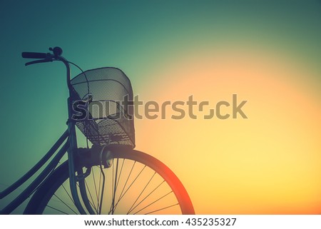 Vintage bike trails in summer tones style.classic vintage style bicycle old greeting cards, post card.close basket