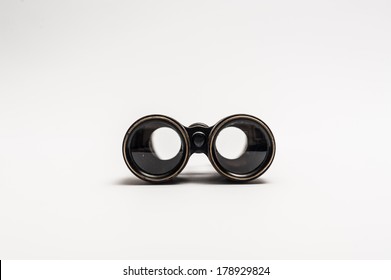Vintage binoculars on a white background