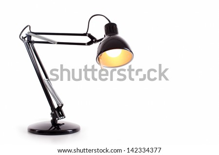 Vintage black desk lamp isolated on white