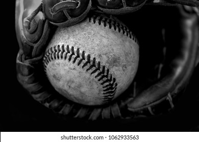 Vintage Black And White Sports Image Of Ball In Mitt.  Baseball Team Equipment.