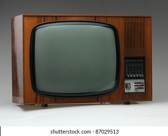 Vintage Black And White Tv On Gray Background, Side View