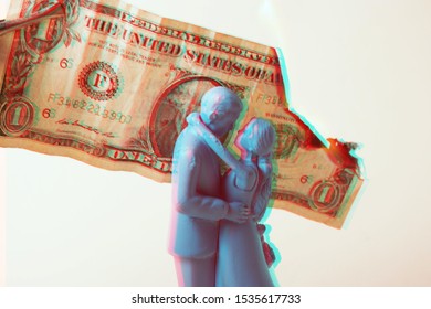 Vintage Blue Wedding Cake Topper Couple In Front Of A Dollar Bill On Fire. Weddings Can Be Costly And A Waste Of Money. Couple Fighting Over Finances. Man And Wife In Financial Trouble Or Divorce. 