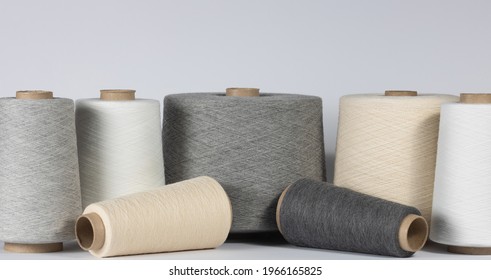 Vintage Bobbins With Cotton Thread Close Up On White Isolated Background. Concept For Textiles, And Thread Industry