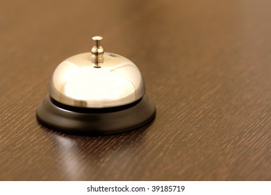 Vintage Brass Bell On Hotel Bellstand