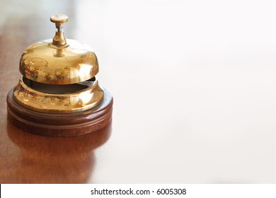 Vintage Brass Bell On Hotel Bellstand