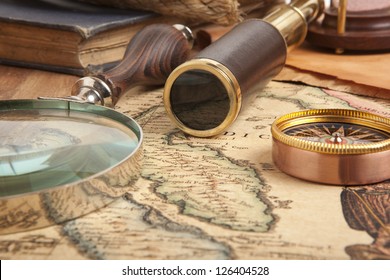 Vintage Brass Telescope On Antique Map