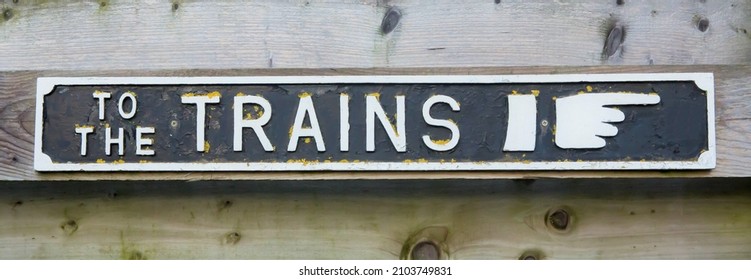 Vintage British To The Trains Sign at a railway station - Shutterstock ID 2103749831