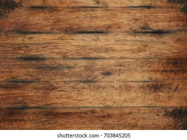 Vintage Brown Barrel Wooden Planks Background Texture With Scratches And Black Stains Over Wood Grain Of Old Aged Oak Barrel Bottom, Close Up