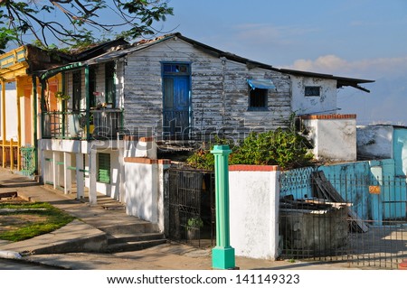 Vintage building in poor neighborhood in Santiago de Cuba, Cuba