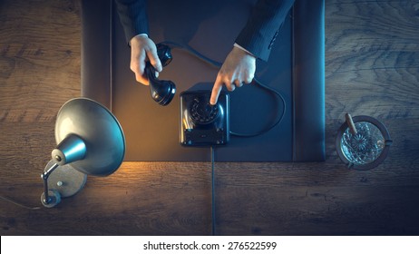 Vintage Business Man Holding The Phone Receiver, Dialing A Number And Phone Calling, Top View