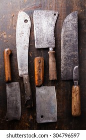 Vintage Butcher Meat Cleavers On Dark Wooden Background