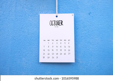 Vintage calendar 2018 handmade hang on the blue wall, October 2018