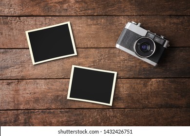 Vintage Camera With Empty Photo Frames. Top View