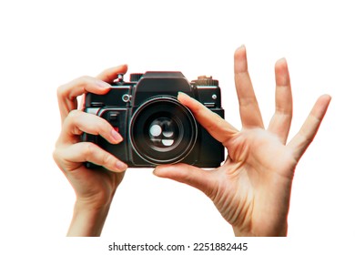 Vintage camera in female hand on white background. Minimalistic still life. Concept art Aberrations