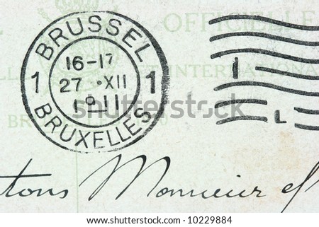 Vintage cancellation stamp from Brussels (Bruxelles) on an old post card (dated 1911).
