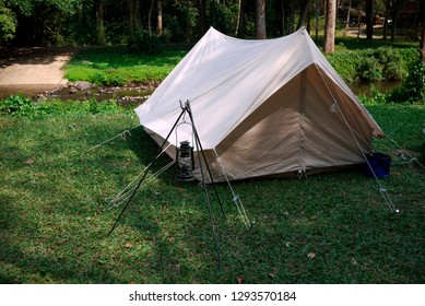 vintage canvas tent and lantern