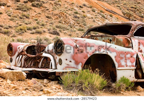 vintage car abandoned in\
Nevada hills