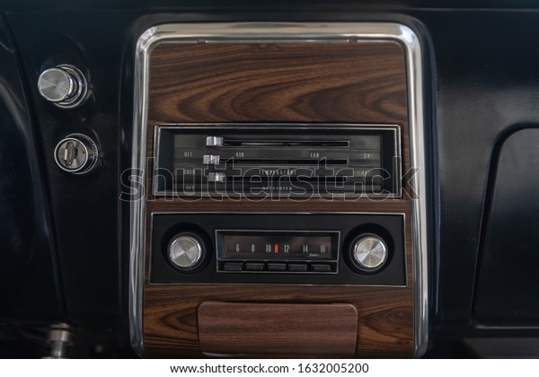 Vintage car dashboard and\
radio