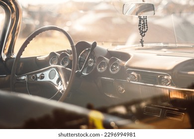 Vintage car interior with steering wheel and dashboard vintage car background - Powered by Shutterstock