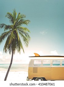 Vintage Car Parked On The Tropical Beach (seaside) With A Surfboard On The Roof