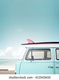 Vintage Car Parked On The Tropical Beach (seaside) With A Surfboard On The Roof