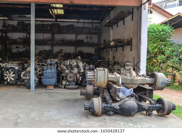 Vintage car repair workshop at downtown in\
Vientiane, Laos.