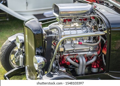 Vintage car roadster engine.Hood scoops on a car.
