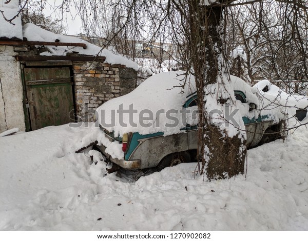 vintage car, car
under the snow, wrecked
car