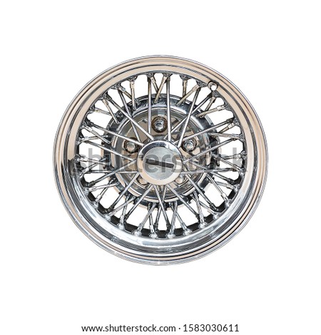 Vintage car wheel with steel chromed spokes isolated on white background.