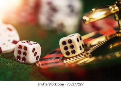 Vintage casino chips on green table with game cards. - Shutterstock ID 753277297