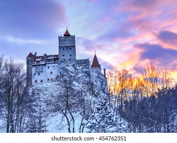 Vintage Castle Of Dracula From Bran City, At Dusk In Transylvania County, Romania