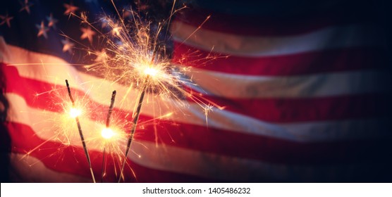 Vintage Celebration With Sparklers And Defocused American Flag - Independence Day

