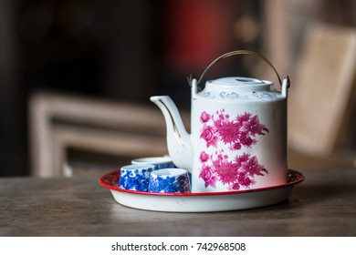 Vintage Chinese teapot and tea cups on wooden table,Chinese Tea set with small tea cups.