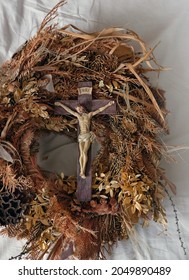 Vintage Christian Crucifix And Wreath Of Dry Autumn Leaves. Spiritual Symbol Of Lent, Orthodox, Catholic, Protestant Religion, Faith In God. Church Holiday Concept