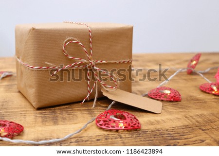 Similar – Image, Stock Photo White gift box with label on wooden table.