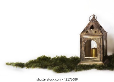 Vintage Christmas lantern on fir branch on white background