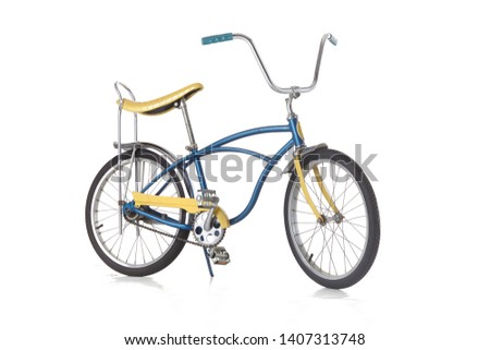 vintage classic banana seat bike from the 1970's isolated on white. vintage schwinn