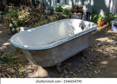 Vintage Claw Foot Bath Tub In Yard